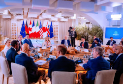 Dr Adesina (left) addresses G7 Meeting.jpg